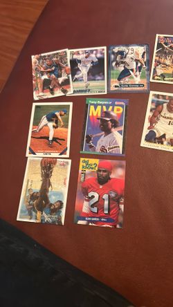 Baseball basketball and football cards