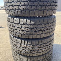 (4) Open Range 285/70LT17 AT tires ~ 10 ply ~ 80% tread  