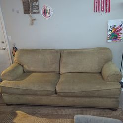 Tan down feather couch