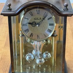 Elegant German-made glass anniversary mantel clock