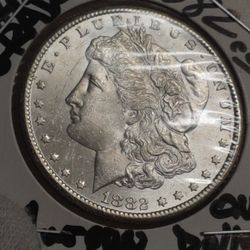 **100% GENUINE**1882-CC**UNCIRCULETED HIGH GRADE +++US SILVER MORGAN ONE DOLLAR**GEM & DEEP MIRROR**