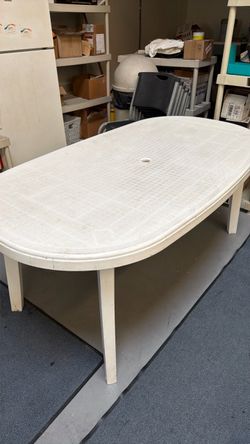 Plastic table with 6  chairs