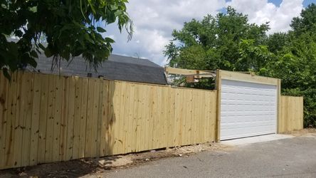 Garage doors and fence