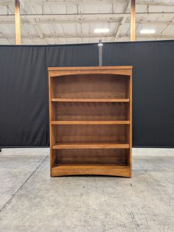 Compact Stained Wood Bookcase with Arched Top