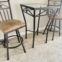 Glass table set with matching chairs