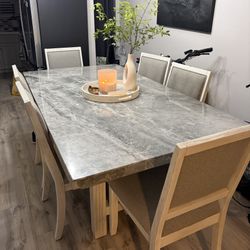 Grey and White Marble Table with Chairs
