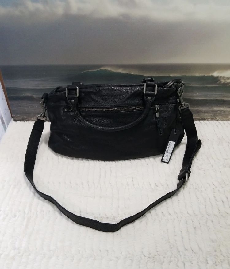 LIEBESKIND BERLIN Black leather purse. $380