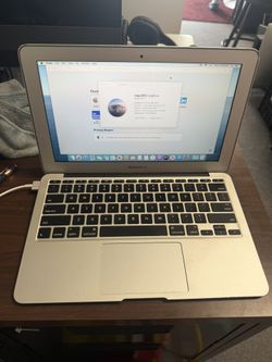 APPLE MACBOOK AIR LAPTOP WITH CHARGER  DEAL 100$ FIRM 