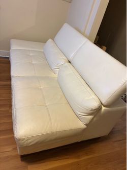 120 obo Modern white faux leather loveseat in good condition. Comfortable, sturdy, and great for apartments, bedrooms, offices, or small living rooms.
