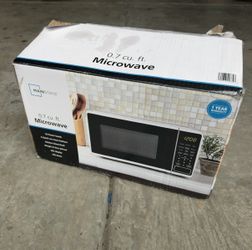 Mainstays 0.7 Cu. Ft. Countertop Microwave 700W – Original Box