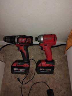2 Milwaukee drills 2 5.0 batteries