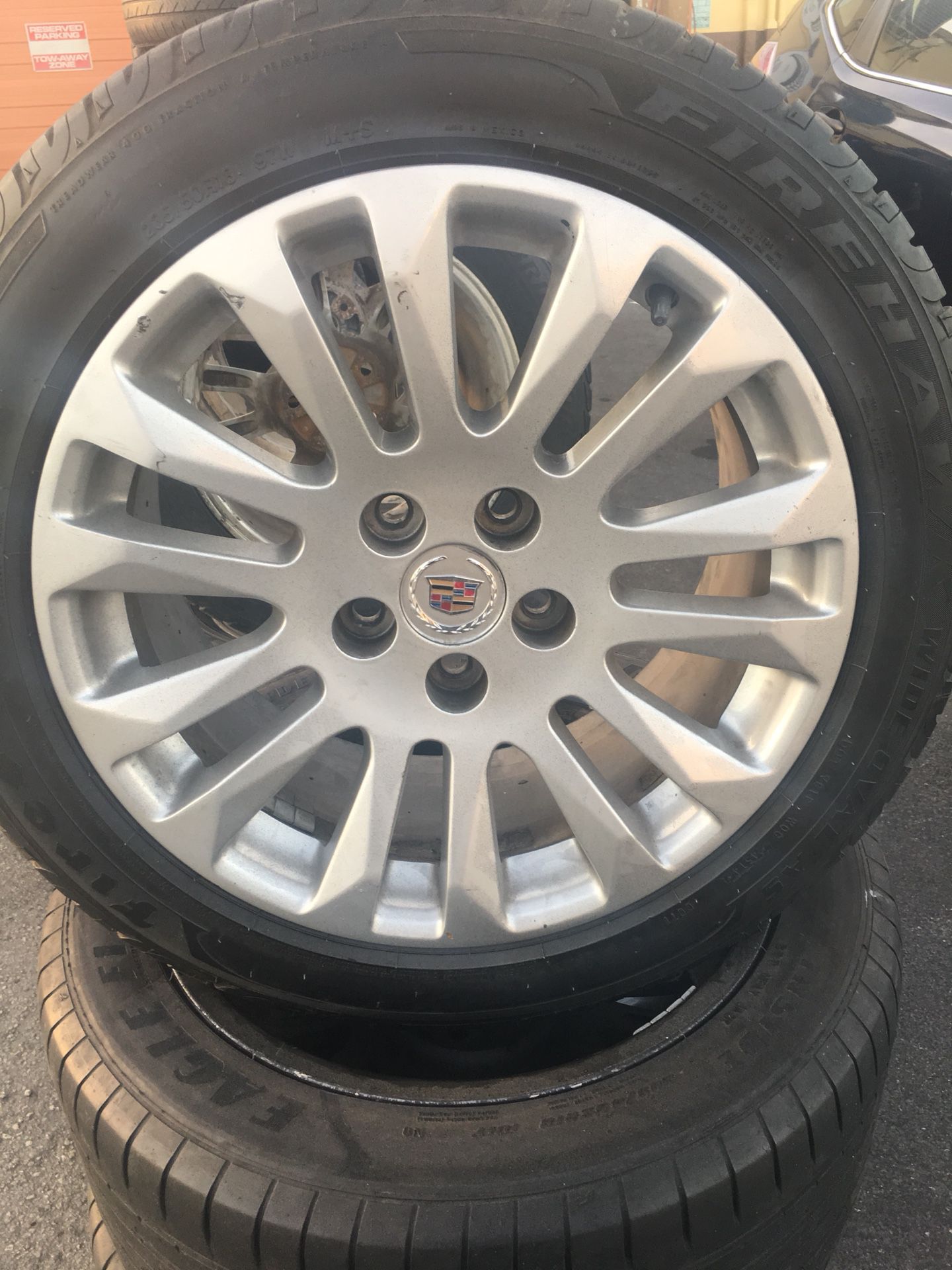 Cadillac stock rims and tires
