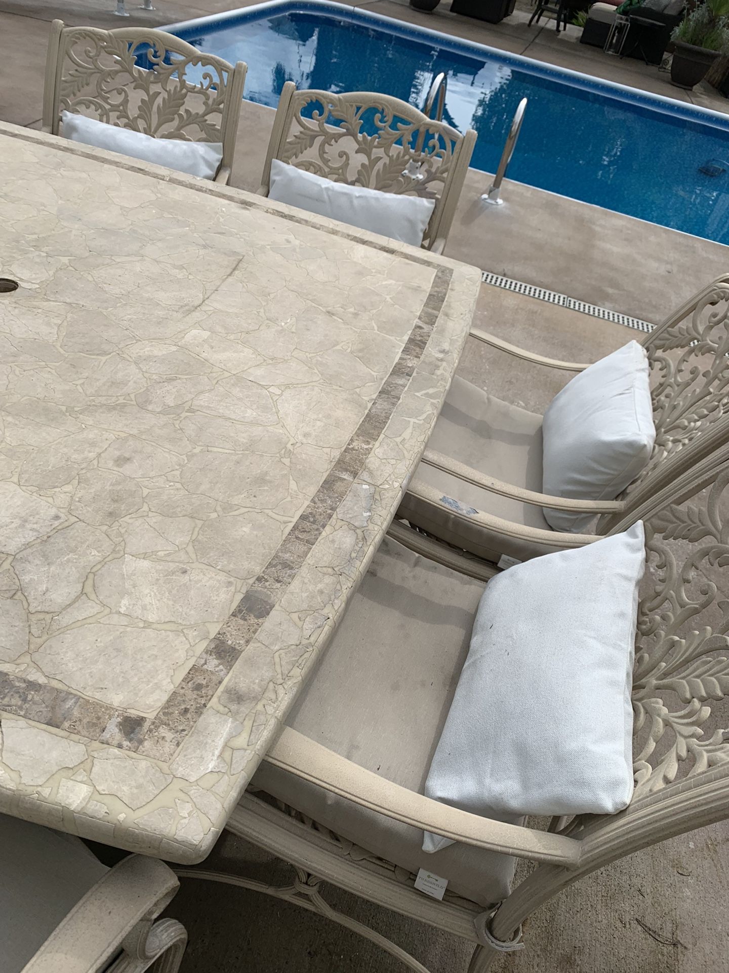 Outdoor Stone Top Patio Table And Cast Iron Chairs For 8 for Sale in