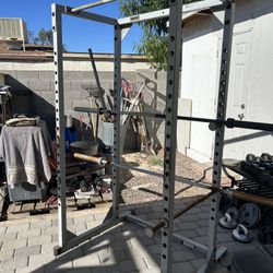 Squat Cage And Dumbbells 