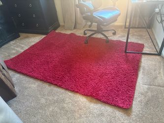 Dark red area rug