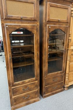 Allen Louis Phillips media cabinets