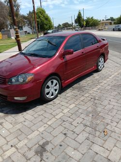 2003 toyota corolla título limpio