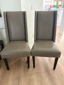 West Elm leather dining chairs, set of two