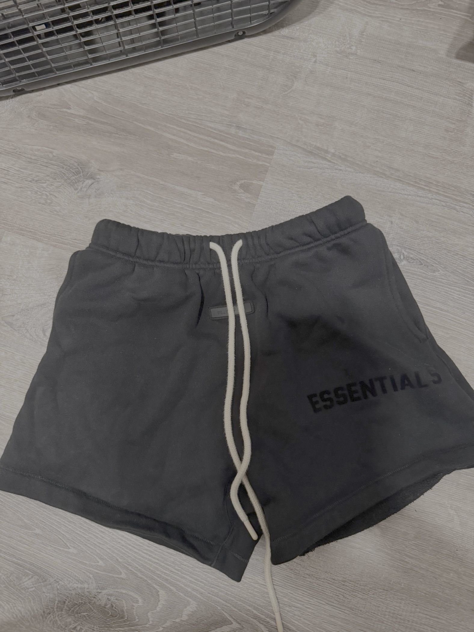 Selling authentic Fear of God Essentials shorts in black, size small