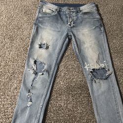 Light blue distressed ksubi jeans