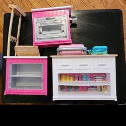 Barbie Ultimate Kitchen.  Use with Playdoh to make veggies, sandwich press, fries press, pies, etc.  Use without playdoh as a "regular" Barbie Kitchen