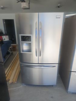 Frigidaire three door French style stainless steel refrigerator.