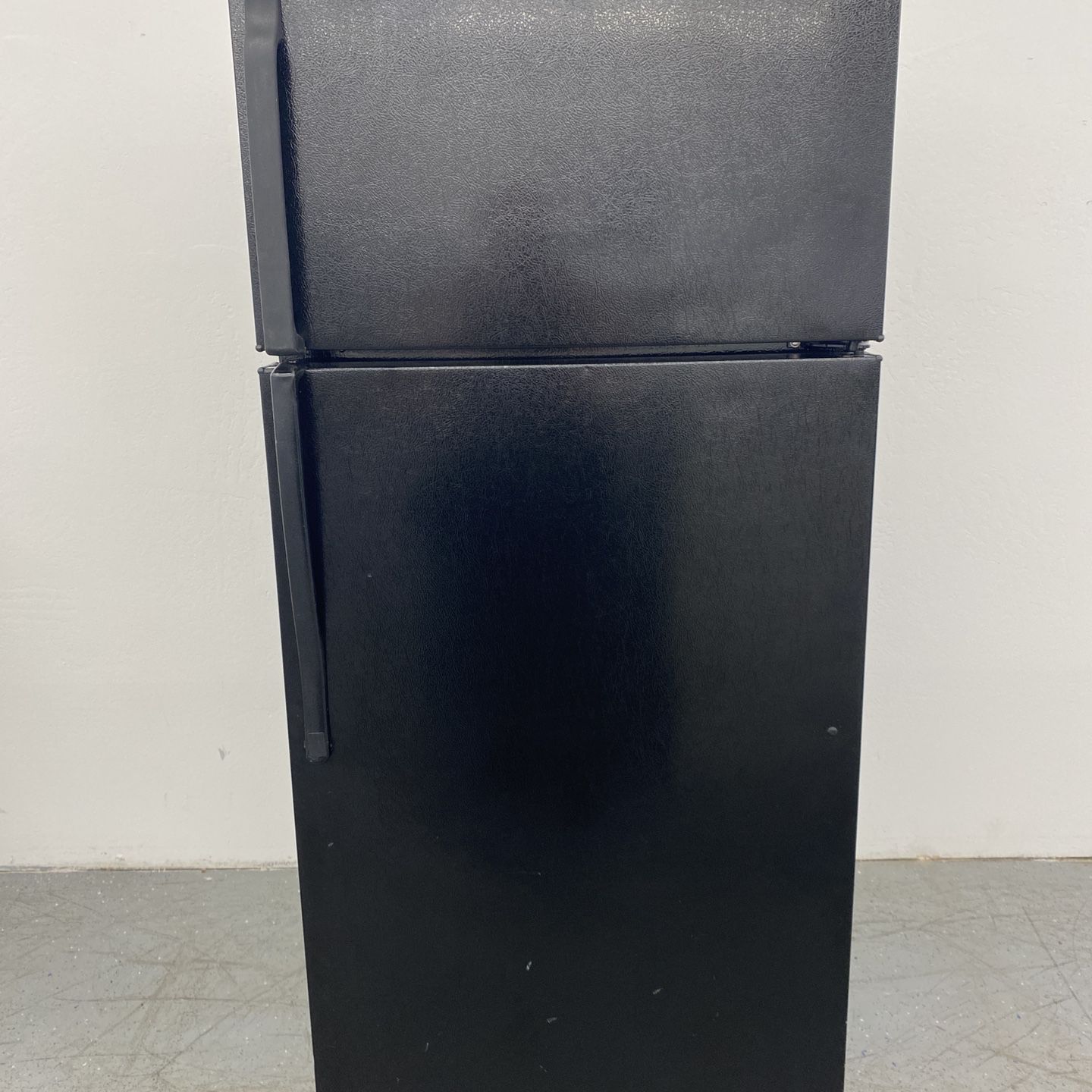 Black GE Top Freezer Refrigerator