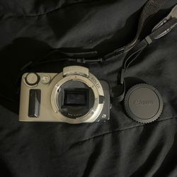 Canon EOS IX camera body, a vintage APS-format SLR film camera