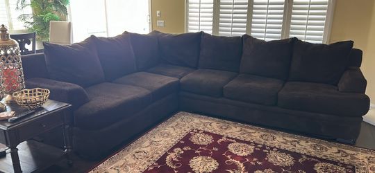 Dark Brown L-Shaped Sectional Sofa with Matching Ottoman