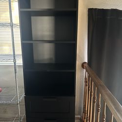 Two Black Shelves With Two Drawers