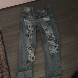 Ripped Butterfly Jeans