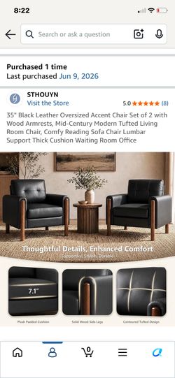 Two large black accent chairs