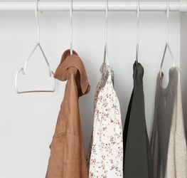 Clean, Classic white IKEA STAJLIG and GARDSMASTARE Metal Clothes Hangers