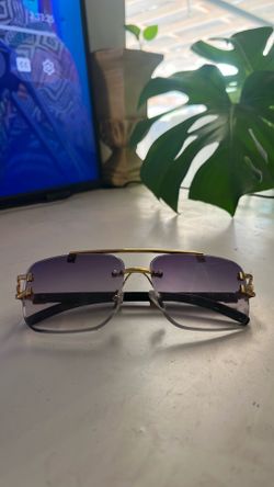 Blue tint Cartier sunglasses shades