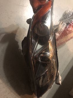 Stock headlight for 09 camry