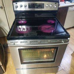 Jenn-Air 5 burner glasstop stove with warming drawer and self cleaning convection oven works perfect
