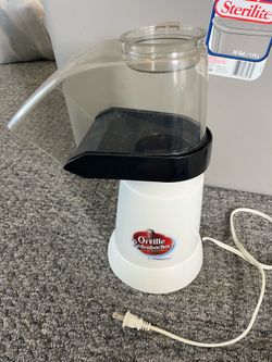Both popcorn air popper and apple baker