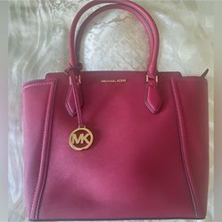 Michael Kors Ayden Berry Leather Tote looks like a new.