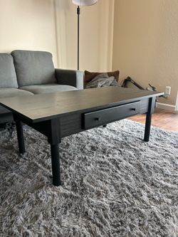 Black coffee table with drawer