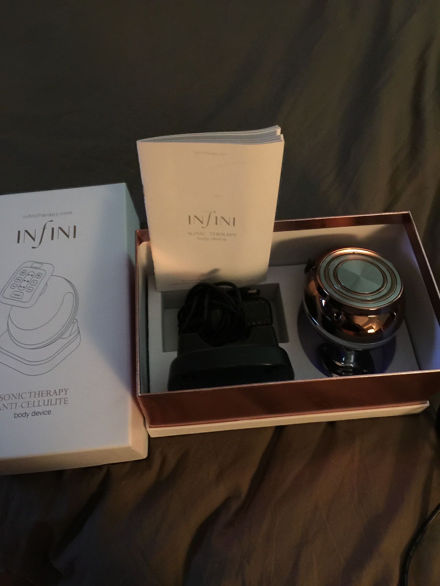 INFINI SONIC THERAPY ANTI CELLULITE BODY DEVICE $4,995.00 on retail website infini {url removed}