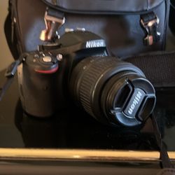 Nikon D5200 with Nikon DX 18-55mm lense Manfrotto Tripod