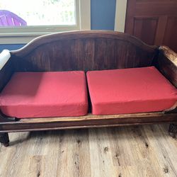 Solid Wood Settee With Red Cushions 