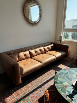 CB2 Marconi 81.5” tufted saddle leather sofa