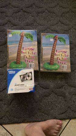 CD’s And Blow Up Palm Tress