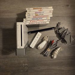 Nintendo wii with games and controller
