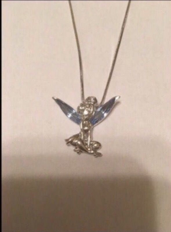 Silver Tinkerbell with silver chain. Crystal wings. Brand new. Never worn.