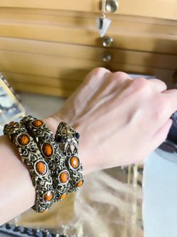 Wraparound snake gemstone bracelet. Tiger eye black onyx. Stunning in person.