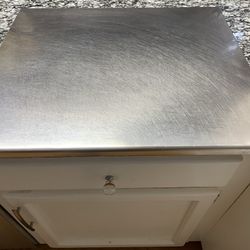 Large Stainless Steel Cutting Board With Curve That Goes Over The Edge Of Counter