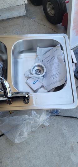 Stainless steel double sided kitchen sink with new faucet ready to install