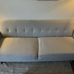 Grey Upholstered Couch
